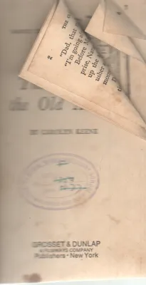 THE CLUE IN THE OLD ALBUM BY CAROLYN KEENE