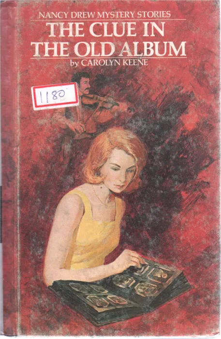 THE CLUE IN THE OLD ALBUM BY CAROLYNN KEENEE