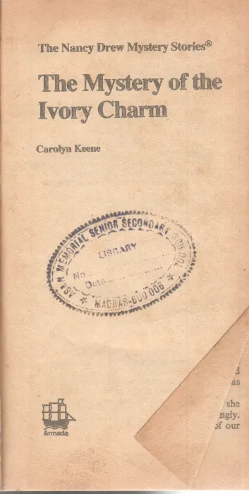 THE MYSTERY OF THE IVORY CHARM BY CAROLYN KEENE